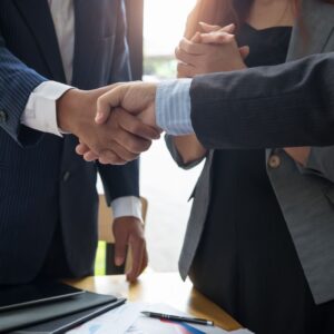 shaking hands with businessman