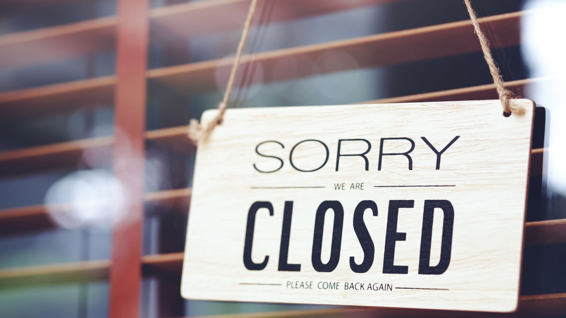 business sign that says Sorry we're closed